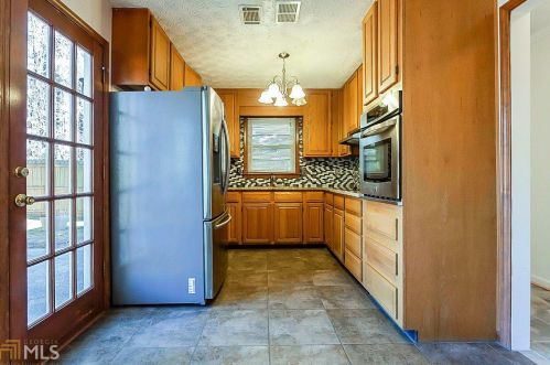 517 Philadelphia Ln, Holly Springs, GA 30189-5216