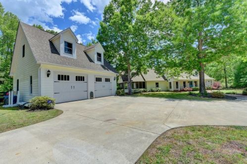 297 Henderson Lake Dr, Holly Springs, GA 30115-8171