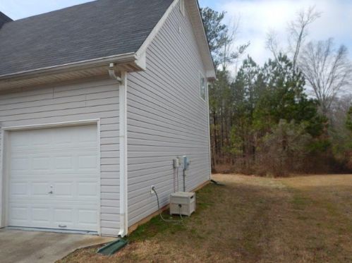 556 Harvick Cir, Stockbridge GA  30281-4460 exterior