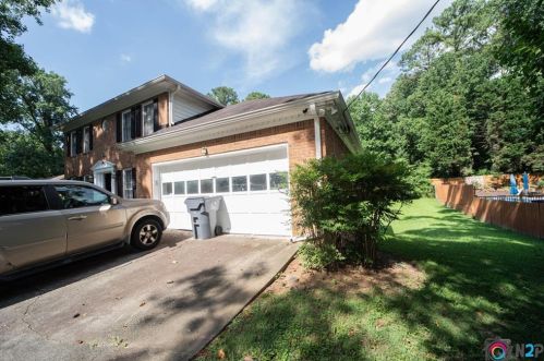 212 Windsong Ln, Lilburn, GA 30047-3950
