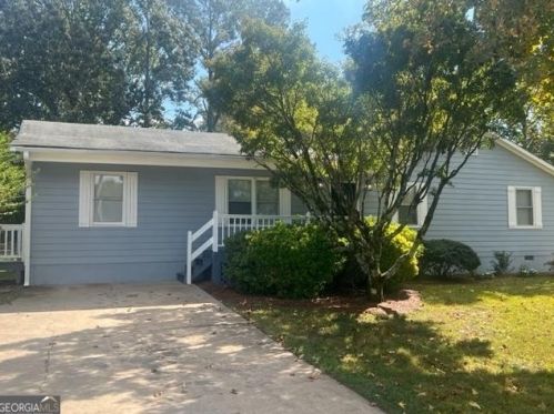 120 Mile Branch Rd, Holly Springs, GA 30114-9559