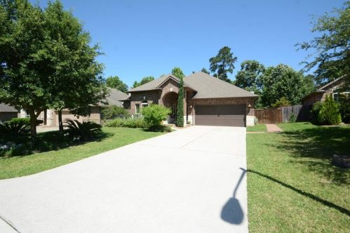 1948 Honey Laurel Dr, Conroe, TX 77304-2156
