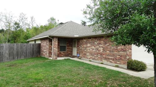 1404 Natural Pine Trl, Conroe TX  77301-7188 exterior