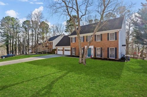 4977 Willow Creek Dr, Holly Springs, GA 30188-4306