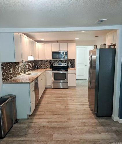 4460 Gill Pl, Denver, CO 80219-2462