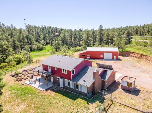 10734 Camelot Dr, Franktown, CO 80116-9471