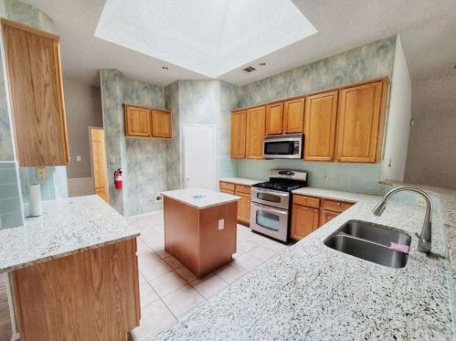 7914 Elkhorn Mountain Trl, Austin TX  78729-6407 exterior
