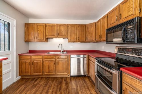 7472 Bates Dr, Denver, CO 80231-6013