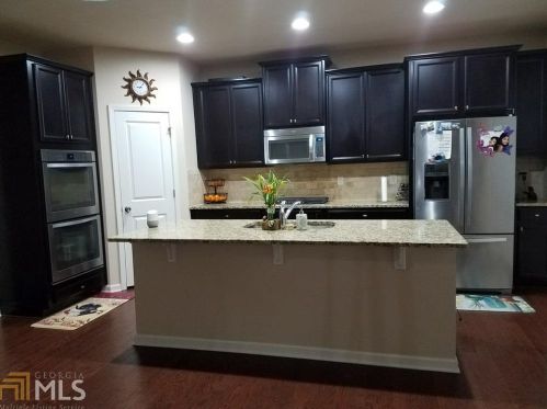 1125 Julius Dr, Suwanee, GA 30024-5434