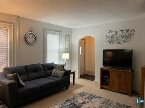 210 4th St, Scanlon, MN 55720-1721