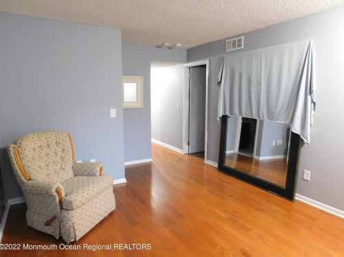 15 Greenwood Dr, East Freehold, NJ 07728-4002