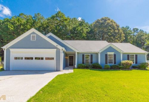 6007 Woodcreek Dr, Holly Springs, GA 30188-2997