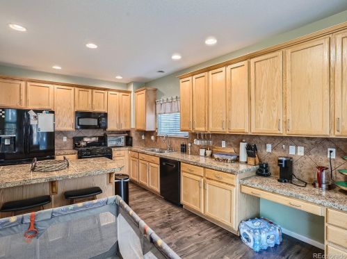 21738 Mansfield Pl, Aurora CO  80018-3058 exterior