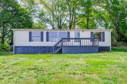 406 Scott Rd, Holly Springs, GA 30115-9145