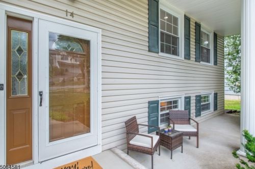 14 Colonial Woods Dr, Town Center, NJ 07052-1615