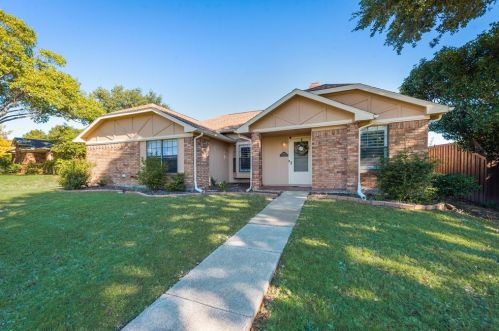 2902 Palisades Dr, Carrollton TX 75007-5083 exterior