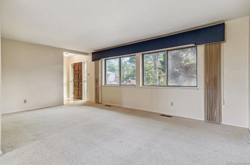 7302 Bates Dr, Denver, CO 80231-6011