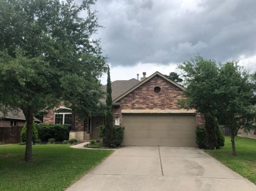 1946 Honey Laurel Dr, Conroe TX  77304-2156 exterior