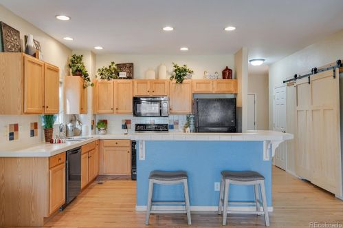 2462 Stage Coach Dr, Milliken CO  80543-3111 exterior