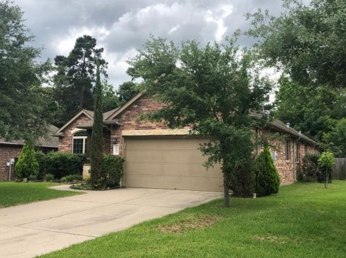 1946 Honey Laurel Dr, Conroe TX  77304-2156 exterior