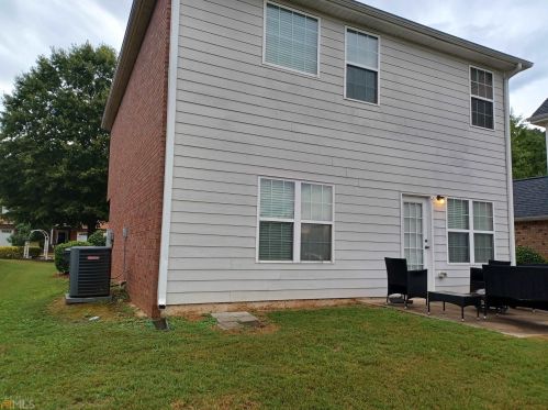 241 Polo Ln, Locust Grove, GA 30248-3693