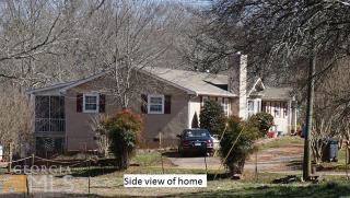 515 Water Tank Rd, Holly Springs, GA 30115-6209