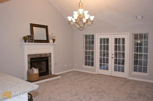 110 Palm Lake Dr, Holly Springs, GA 30115-9305