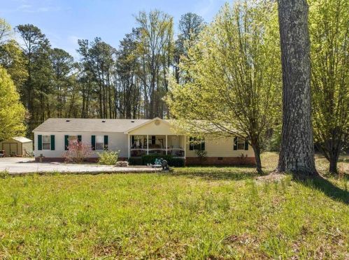 650 Bart Manous Rd, Holly Springs, GA 30115-6510