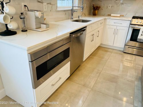 140 Plumstead Dr, East Freehold NJ  07728-9513 exterior