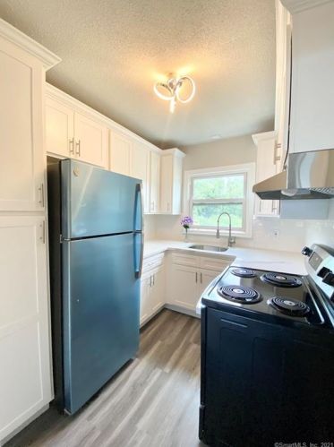 208 Point Beach Dr, Milford, CT 06460-7651