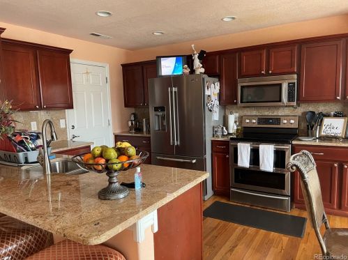 768 Willow Dr, Denver CO  80603-7727 exterior