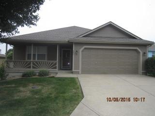 603 Sun Dr, Raymore, MO 64083-9019