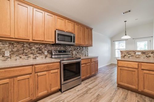 15624 Fisher Is Dr, Austin TX  78717-3833 exterior