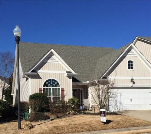 129 Village Dr, Holly Springs, GA 30114-8265