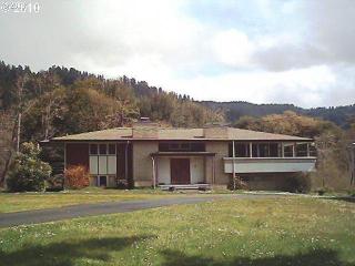 171 Woodpecker Ln, Elkton, OR 97436-9644