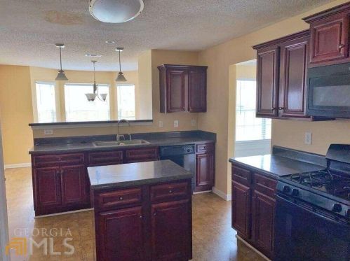 1897 Sawgrass Dr, Hampton GA  30228-5314 exterior