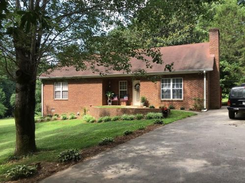 606 Sam Nelson Rd, Holly Springs, GA 30114-5240