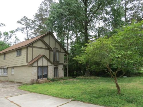 665 Ravensworth Dr, Conroe TX  77302-3737 exterior