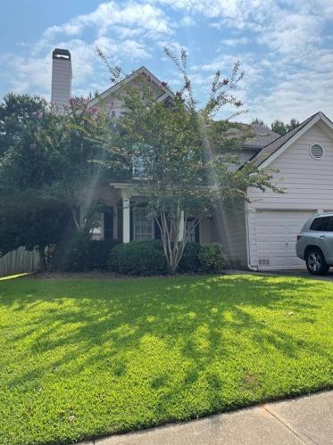 115 Windsong Trl, Holly Springs GA  30114-6659 exterior