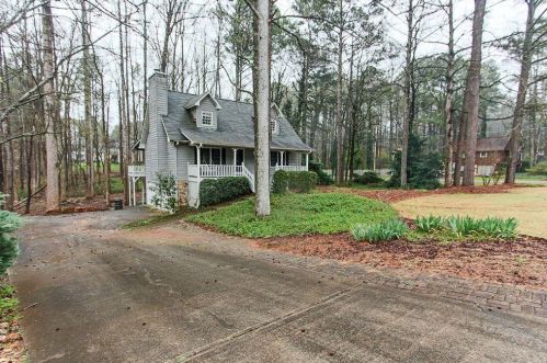 215 Emerald Cove Ln, Holly Springs, GA 30189-5158