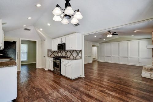 1306 Dusky Thrush Trl, Austin TX  78746-6633 exterior