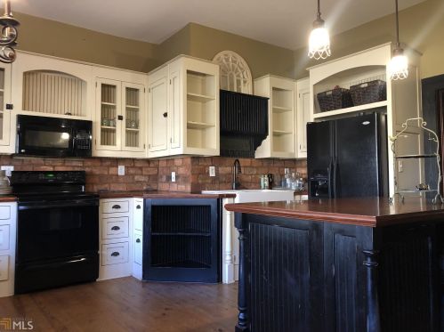6193 Collins St, Porterdale, GA 30014-1420