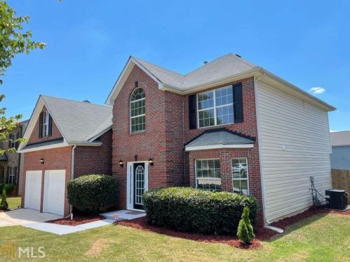 1774 Wood Stork Dr, Hampton, GA 30228-5305