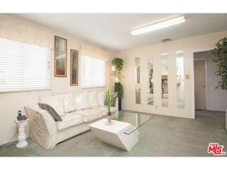 8633 Cimarron St, Los Angeles, CA 90047-3216