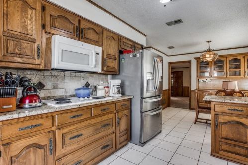 9738 Amberley, Dallas TX  75243-2303 exterior