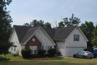 35 Hugh Dr, Porterdale, GA 30016-9026