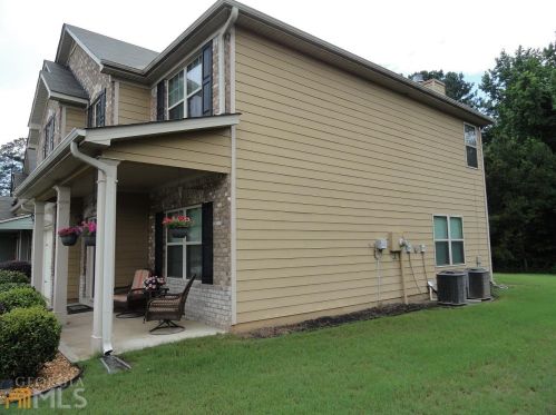35 Trevers Lake Dr, Porterdale, GA 30016-1995