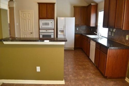 6906 Grants Hollow Ln, Richmond TX  77407-3827 exterior