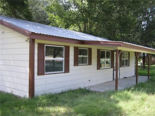 240 Travis Rd, Hills, TX 78659-4833