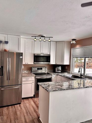 2874 Ouray Way, Denver, CO 80013-1945